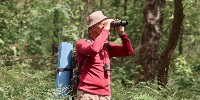 Image of a man in nature who has learned about urinary prostate cancer tests.